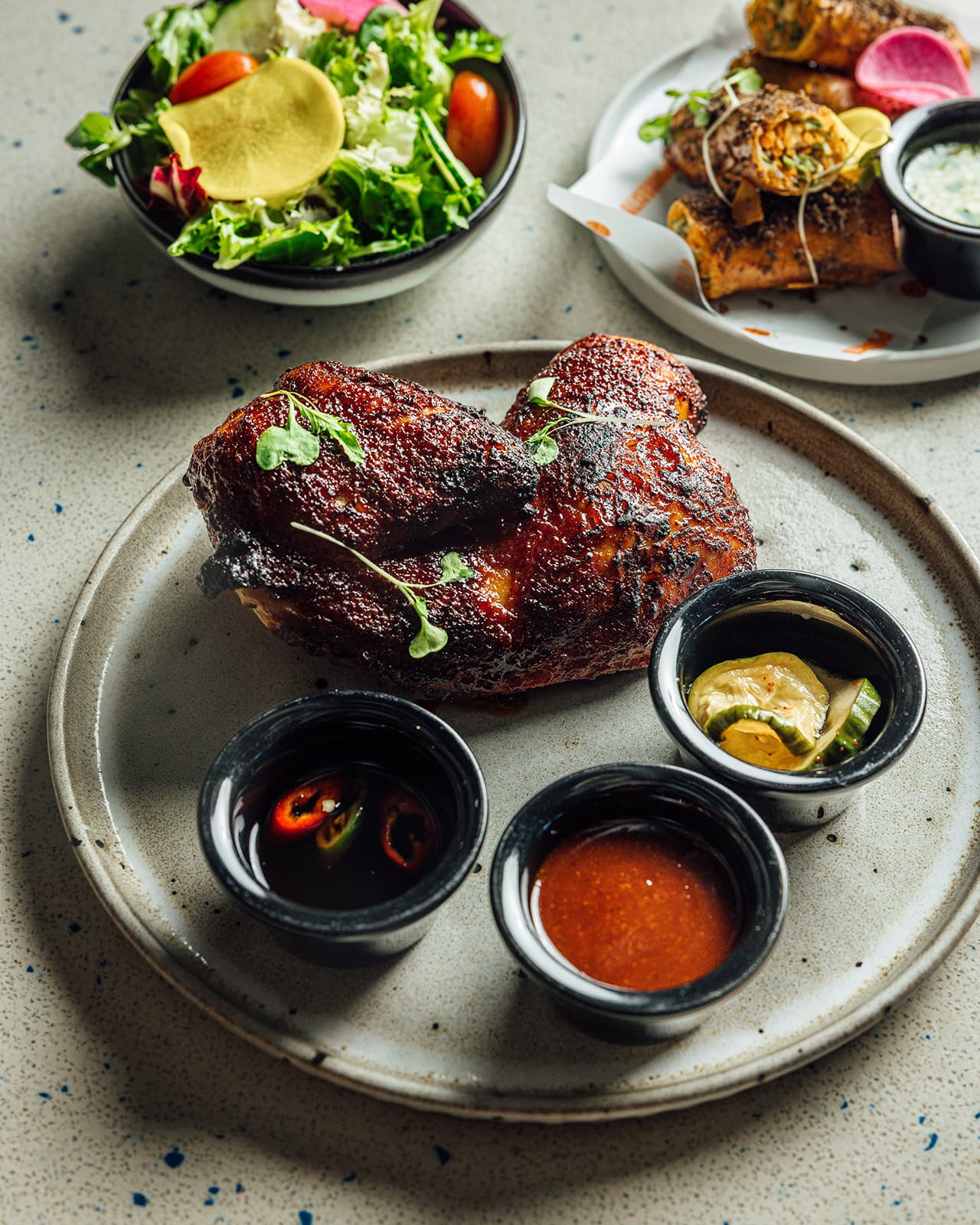 Glazed roast chicken with dipping sauces